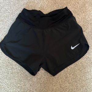 Women’s XS Nike running athletic shorts! Lightly used, has drawstrings inside.
